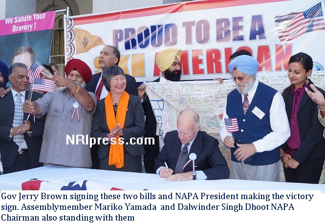 California Gov Jerry Brown signed the two bills Civil rights act-1964 and B-1540 during peace and Unity rally for Sikh shooting victims